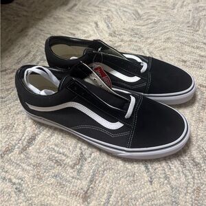 Vans Men's Black and White Slip-On Sneakers